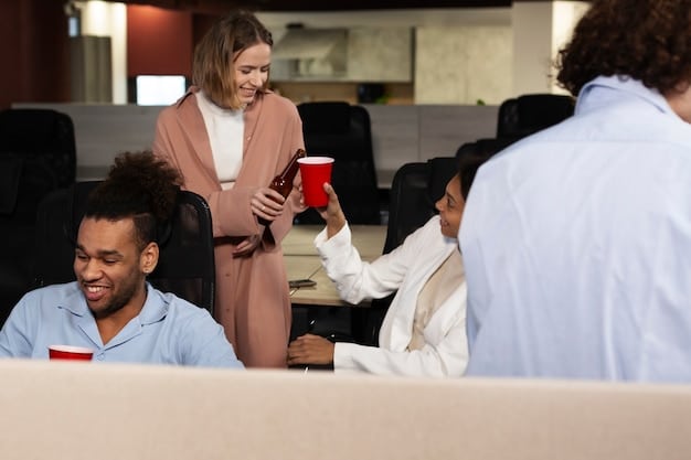 A medium shot of a diverse group of people having a meeting in a modern office. The focus is on the presenter and the engaged audience.