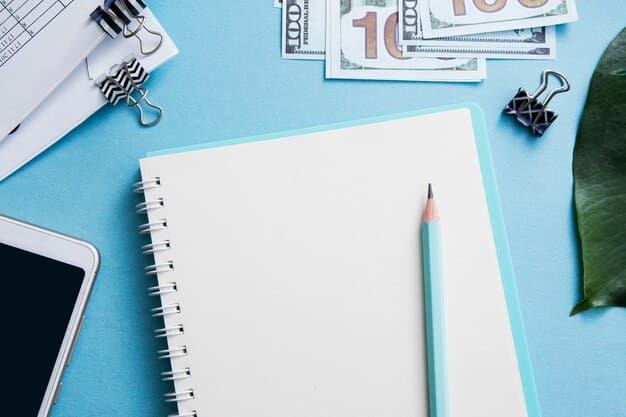 A close-up of a notebook and pen, with handwritten notes detailing income and expenses. The background is blurred, suggesting a focused and organized approach to financial planning.