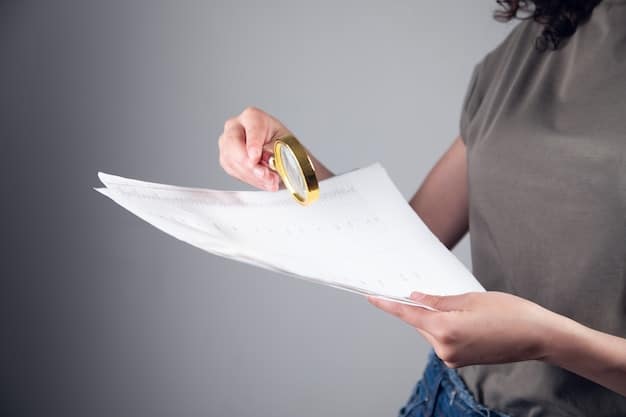 Close-up shot of a hand pointing to a specific section of a financial statement document. The document includes balance sheets, income statements, and cash flow statements, with highlighted sections and annotations. The surrounding environment includes other documents and a calculator, suggesting a detailed financial analysis.
