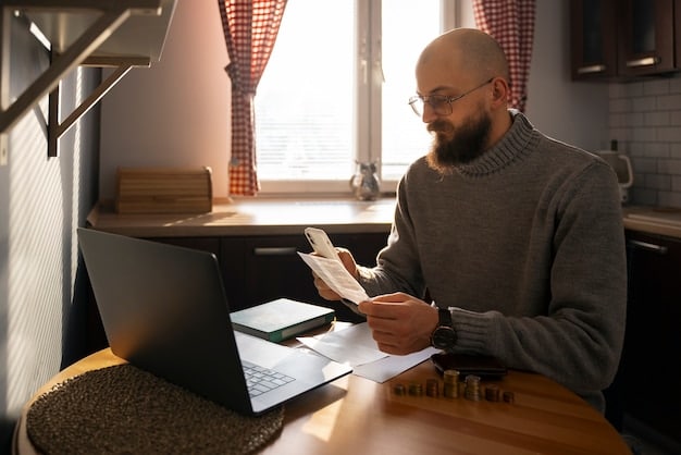 A person using a laptop to research different debt consolidation options and compare interest rates.