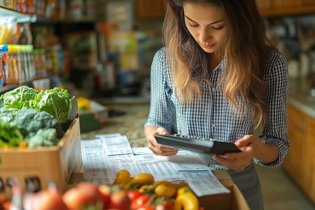 A person using a calculator while reviewing a grocery receipt, highlighting the importance of tracking spending. Various store discount cards are organized nearby.