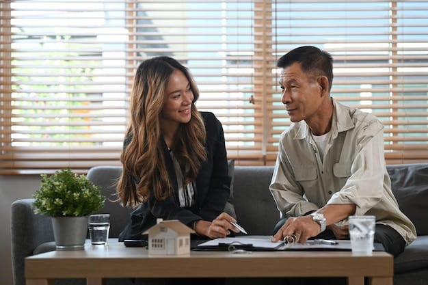 A Filipino family discussing financial plans with a financial advisor in a bright, modern office setting.